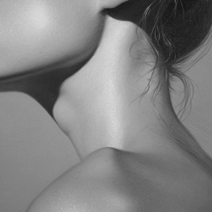 Close-up of a person's neck and shoulder with a blurred background